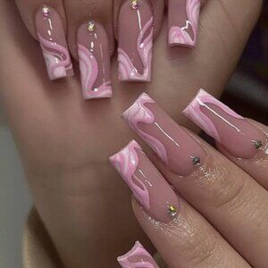 Beautiful press-on or glue-on nails.